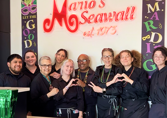 GRG team members at Mario's Seawall celebrating Mardi Gras